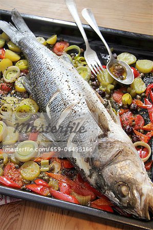 Sea bass on bed of vegetables