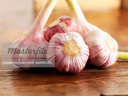 Garlic bulbs on a wooden table