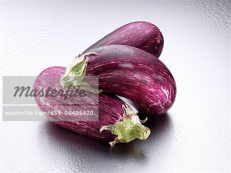 Three aubergines