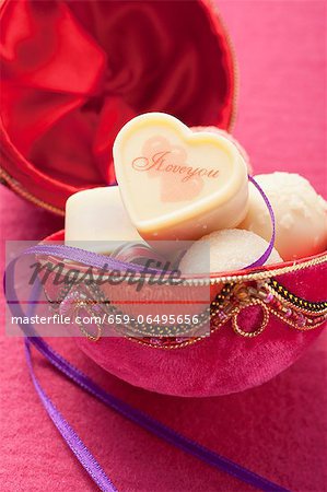 Pralines in a round gift box for Valentine's Day