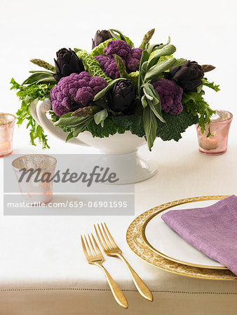 Table Centerpiece Made from Purple Artichokes and Cauliflower Table Centerpiece Made from Purple Artichokes and Cauliflower