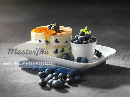Pancake cake with quark, blueberries and honey