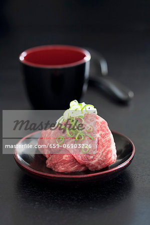 Wagyu beef with chervil and sliced spring onions