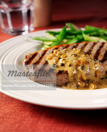 Grilled steak with green pepper sauce Grilled steak with green pepper sauce