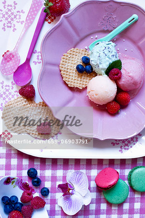 Scoops of fresh peppermint, melon and strawberry ice cream Scoops of fresh peppermint, melon and strawberry ice cream