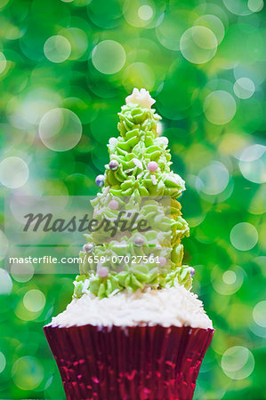 A Christmas tree cupcake