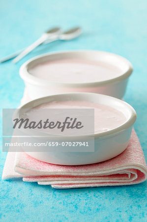 Small bowls of rose mousse