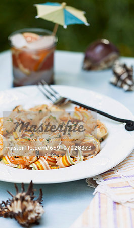 Colourful pasta with prawns and a garlic and cream sauce Colourful pasta with prawns and a garlic and cream sauce