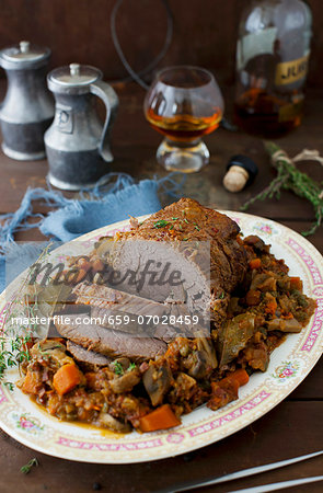 Pot Roast with Mushrooms and Carrots on a Platter