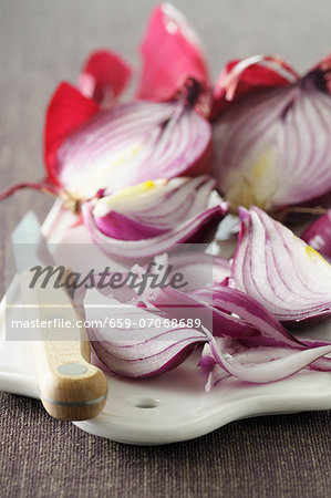 Red onions, halved and in wedges