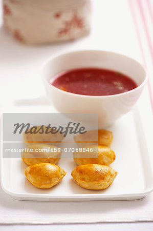 Yeast dumplings with a lentil and tomato filling and borscht