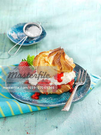 Profiterole with strawberry liqueur and strawberries