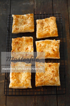Puff pastry slices with sliced almonds