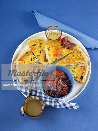 Courgette quiche with tomato and onion salad