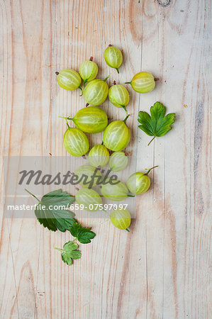 Gooseberries on a wooden surface
