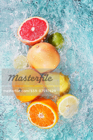 Assorted citrus fruits in water