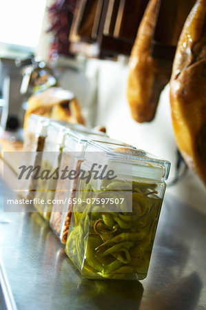Pickled chillies in jars Pickled chillies in jars