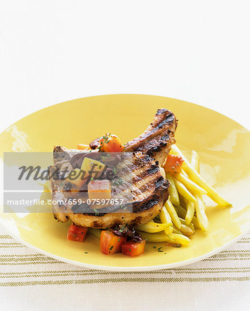 Grilled pork chop with yellow beans and carrots Grilled pork chop with yellow beans and carrots