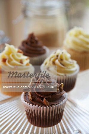 Chocolate, vanilla and caramel cupcakes