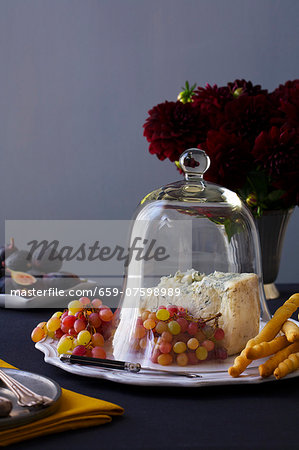 Blue Cheese and Grapes under a Cheese Dome and a Plate of Figs