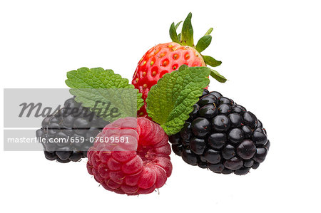 Raspberries, blackberries and strawberries on white background