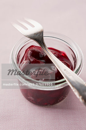 Cherry jam in a glass