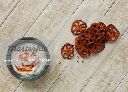 A spicy yogurt dip with oven-baked lotus root chips