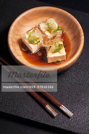 Hiyayakko (cold silk tofu, Japan) with bonito flakes, chives, grated ginger and soy sauce