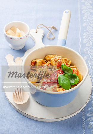 Tortellini with tomato sauce, basil and Parmesan