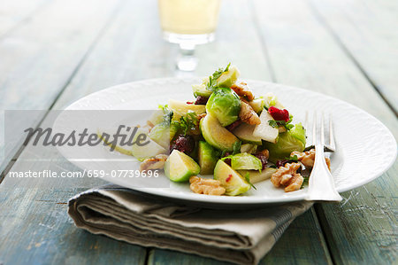 Brussels sprout salad with pear and walnuts