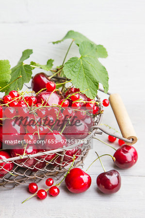 An arrangement of red summer fruits