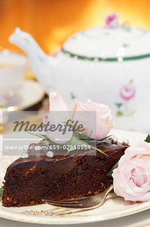 Chocolate Cake And Tea With An Open Fire In The Background Stock Photo Masterfile Premium Royalty Free Code 659 07958954