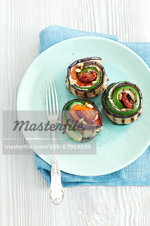 Grilled courgettes and aubergine roles with peppers and cream cheese Grilled courgettes and aubergine roles with peppers and cream cheese