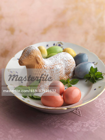 An Easter lamb with colourful eggs An Easter lamb with colourful eggs