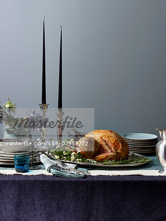 Roast turkey on a festive table