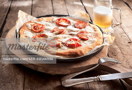 Margherita pizza and beer