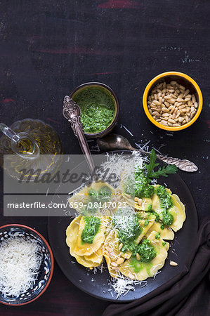 Ravioli with rocket pesto, Parmesan and pine nuts