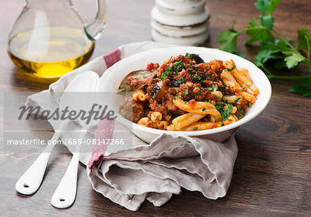 Pasta with a lamb and aubergine sauce and yoghurt