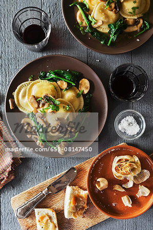 Ravioli with spinach, mushrooms and Marsala served with garlic crostini (seen from above)