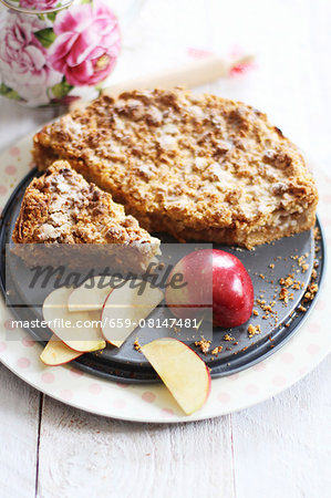 Apple cake and fresh apples