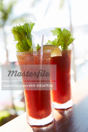 Two Bloody Mary's at a beach bar Two Bloody Mary's at a beach bar