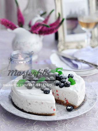 Cheesecake with summer berries, sliced Cheesecake with summer berries, sliced