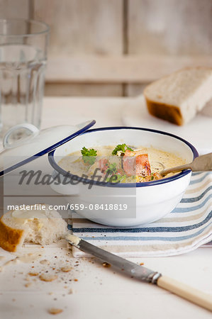 Leek and potato soup with bacon and bread