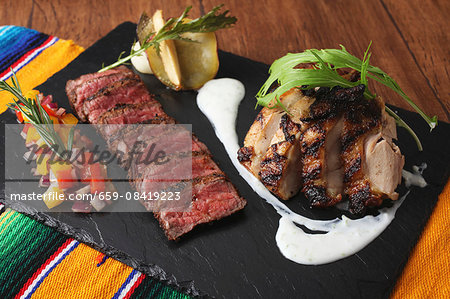 A grill platter with beef and chicken (Mexico)