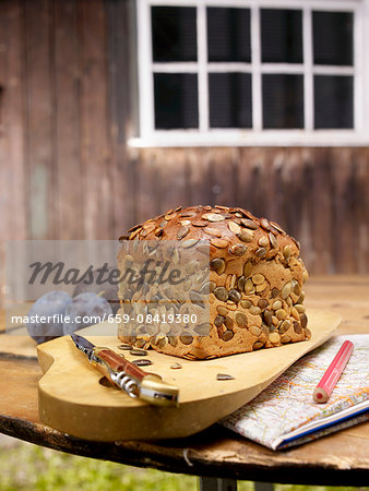 Pumpkin seed bread on a rustic garden table