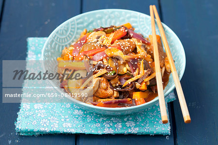 Sweet and sour pork with vegetables and mushrooms (China)