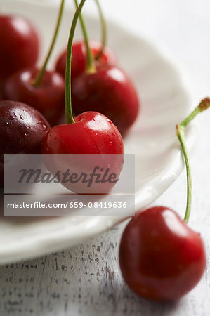 Cherries on a white plate Cherries on a white plate