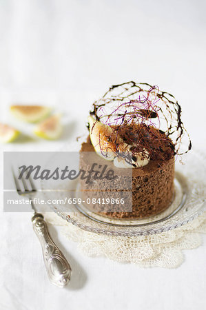 Mousse au chocolate decorated with caramel threads