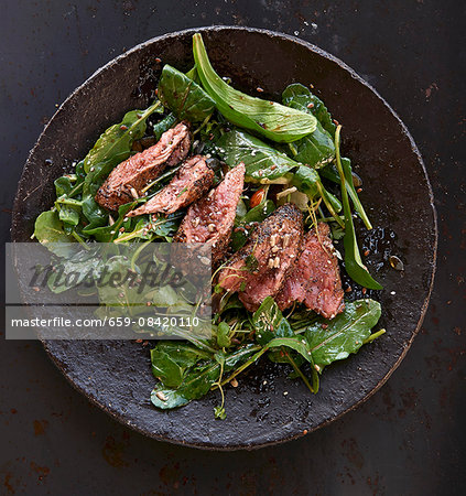 Wild lettuce with peppered steak