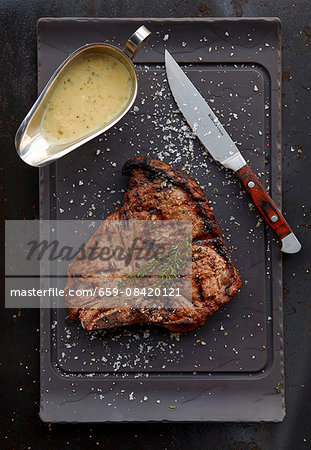 Grilled T-bone steak with gravy